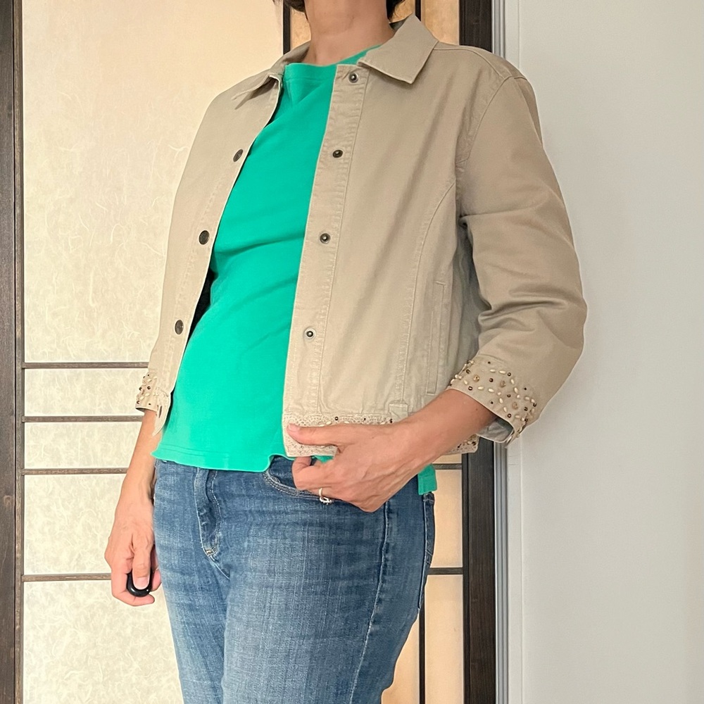 Jean jacket and pants set with beaded trim.